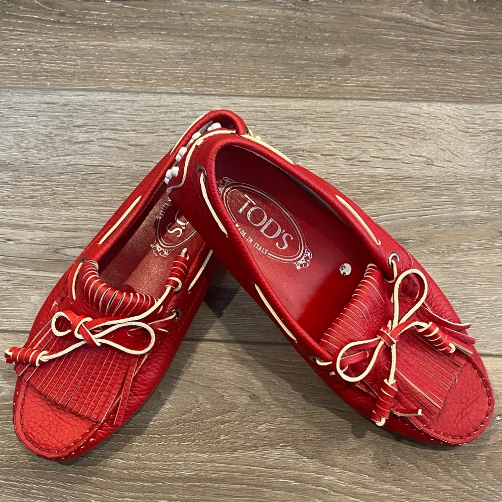 Tod’s red loafers